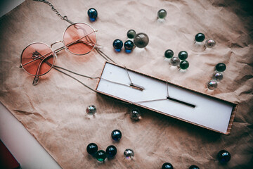 glass balls, cotton sprig and women's jewelry