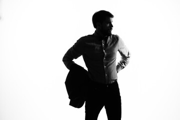 portrait of a man shadow gun in the hands of a detective crime incognito