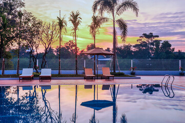 Obraz premium Beautiful Sunrise at Swimming Pool in the morning