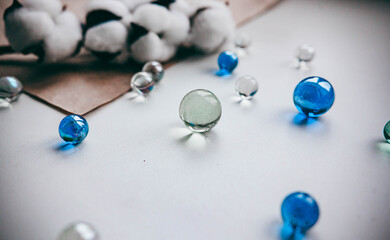 glass balls lie on a white background