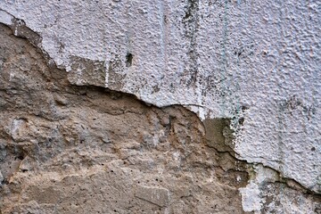 Old wall. Old peeling white paint on concrete wall, texture background