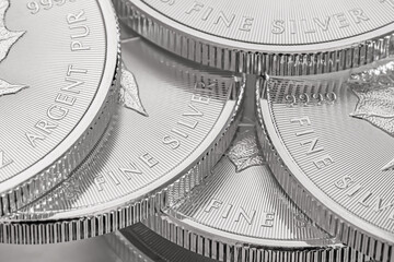Fototapety  Closeup shot of maple leaf fine silver coins from the Royal Canadian Mint