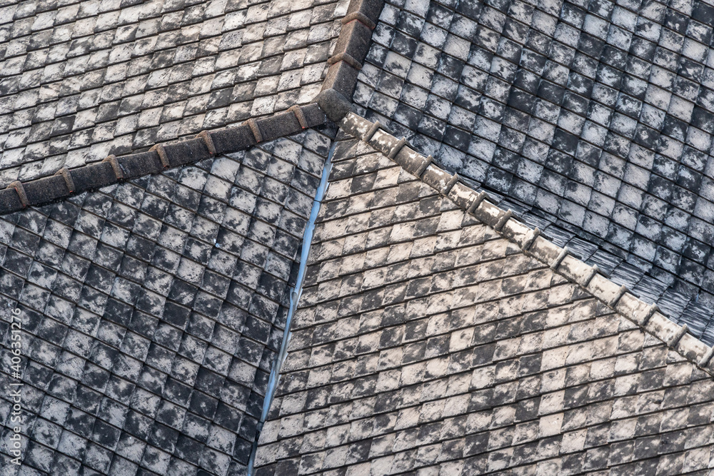 Poster Antique tile roof exterior architecture building to be conserved an old house in the past 100 years old in South East Asia, Thailand.