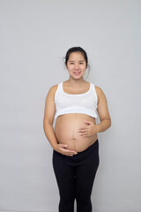 young happy Asian pregnant woman