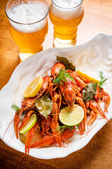 Crayfish. Red boiled crawfishes on table in rustic style