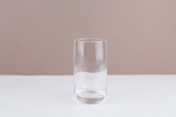 glass cup on white brown background stylish in the kitchen