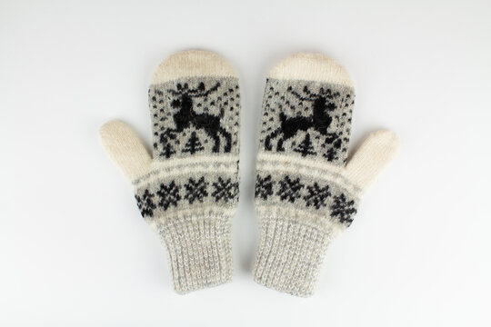 Women's Winter Knitted Mittens On A White Background