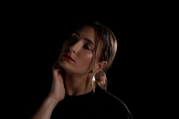 Young Woman in a black dress dancing, Young professional dancer practicing in a studio , dancer