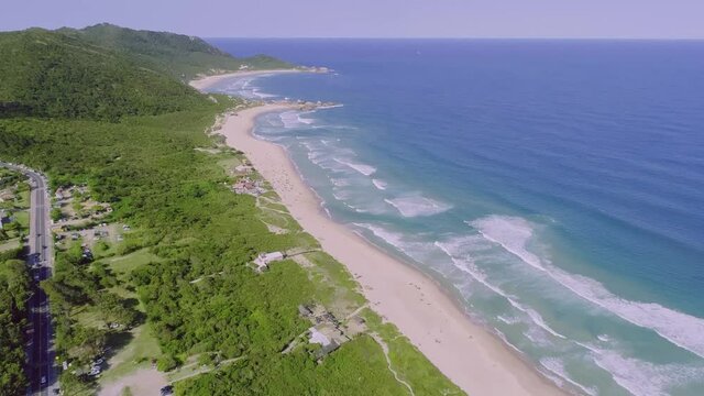 Aerial view of Mole Beach, Florian&oacute;polis, Brazil. Praia Mole. 4K.
