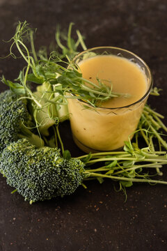 green smoothie on the stone background