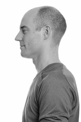 Obraz premium Close up profile view of bald Caucasian man