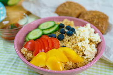 Bulgur porridge with vegetables and sauce top view