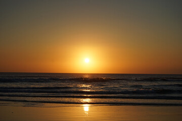 Beautiful sunset landscape of Nusa Dua Beach at dusk, Bali island, Indonesia