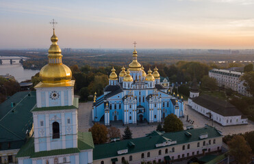 Fototapeta na wymiar Aerial drone panoramic city view. St. Michael's Cathedral in Kiev on a clear autumn morning. View from above. Space for text.