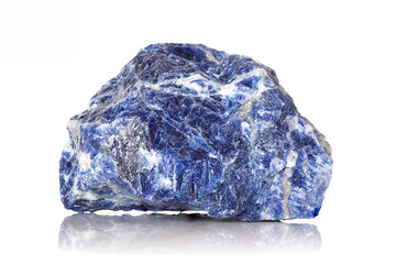 Amazing closeup macro of colorful blue veined sodalite mineral 
stone specimen isolated on white...