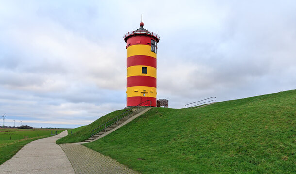 Famous lighthouse of Pilsum in Easter Frisia aka Ostfriesland at the North Sea coast