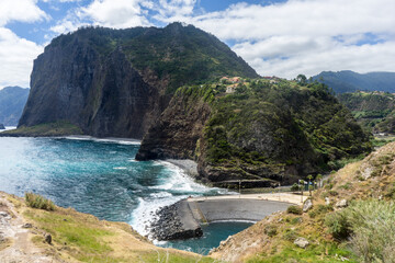 Fototapeta na wymiar Majestic view from Miradouro do Guindaste with high cliffs facing the atlantic ocean, Madeira Island