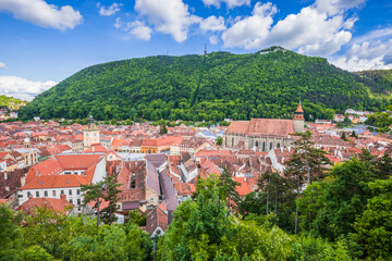 Fototapeta na wymiar Brasov, Transylvania. Romania. Panoramic view of the old town center and Tampa mountain.