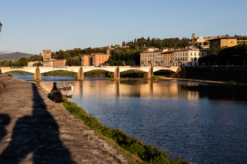 Fototapeta na wymiar Ponte alle Grazie bridge over the Arno river in Florence. panorama of florence