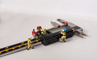 Electronic precision caliber maintenance miniature worker.
