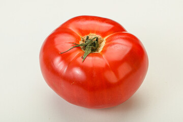Ripe big juicy red tomato