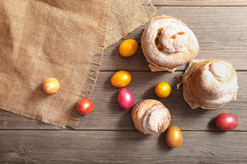Homemade Easter Kraffins and  eggs on wooden background