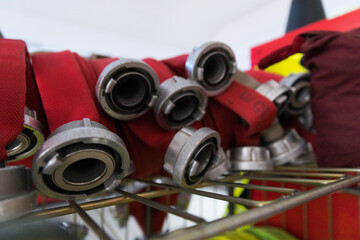 Symboldbil Feuerwehr mit Feuerwehrschlauch