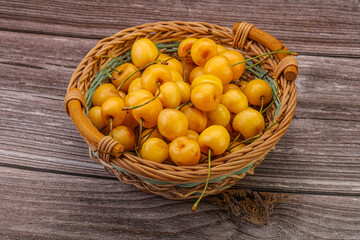 Sweet ripe yellow cherry heap
