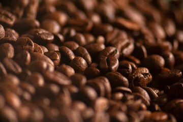 Close up Roasted coffee beans with copy space. macro. Fresh coffee grains wallpaper. Coffee shop.