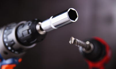 Fototapeta premium A screw gun and a pistol-grip cordless drill