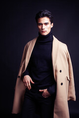 Obraz premium handsome asian fashion looking man posing in studio on black background, lifestyle modern people concept