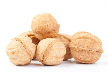 delicious pastry nuts with condensed milk isolated on white
