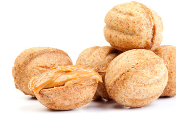 delicious pastry nuts with condensed milk isolated on white