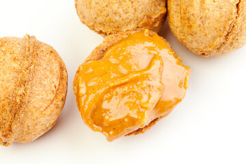 Traditional Russian nuts with condensed milk isolated on a white background. Nut cakes for New Year's holidays.