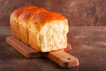 Fotobehang Homemade soft, fluffy white bread loaf © manyakotic