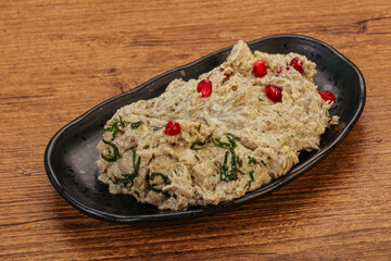 Vagan dietary cusine - mutabal with granet seeds