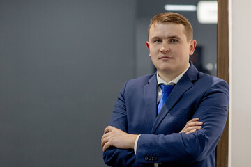 portrait of concentrated lawyer working at workplace with documents in office