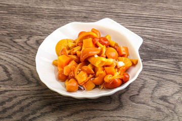 Marinated pickled honey mushrooms in the bowl
