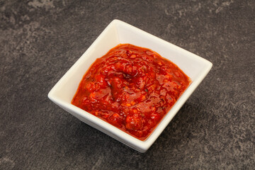 Tomato spicy sauce in the bowl