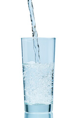 Pouring water. Pouring fresh clean drinking water to glass. isolated on white