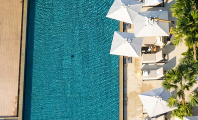 Aerial Top view of a refreshing turquoise swimming pool