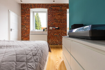 brick wall in the modern bedroom interior