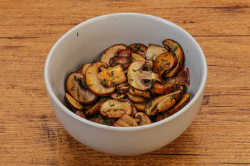 Roasted champignon with herbs and spices