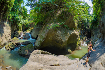River flowing through jungle at  the Hidden Canyon Beji Guwang