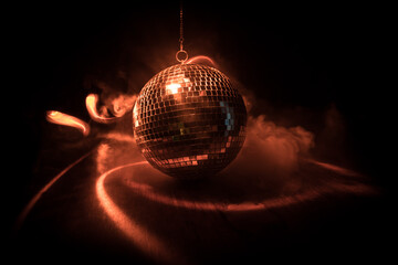 Colorful disco mirror ball lights night club background. Party lights disco ball. Selective focus