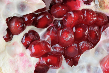 Red ripe sweet peeled pomegranate