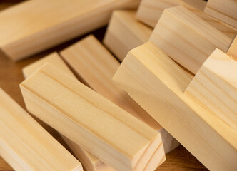 small wooden blocks stacked on. Wood texture, background. Jenga wooden planks. High quality photo