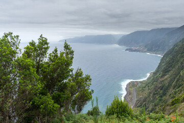 Fototapeta na wymiar Viewpoint on Madeira on steep mountain cliffs
