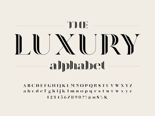 Modern gothic display alphabet design with uppercase, lowercase, numbers and symbol