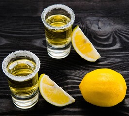 Tequila drink served in glasses with lime and salt